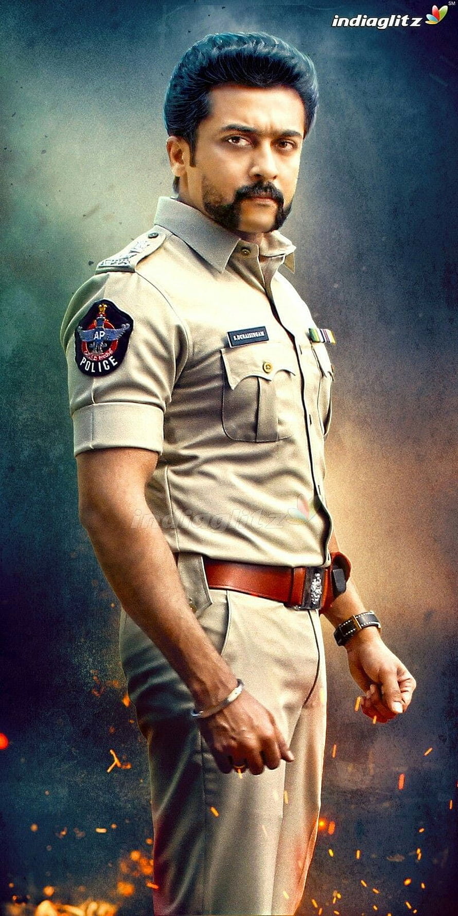 Shabaaz Ahmed as a stern police officer in a khaki uniform with dramatic sparks and dark background HD phone wallpaper