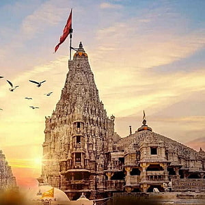 Dwarkadhish Temple at Sunset with Birds in Flight and Red Flag HD phone wallpaper