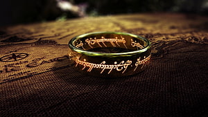 The One Ring from Lord of the Rings with Glowing Elvish Script on an Ancient Map HD wallpaper