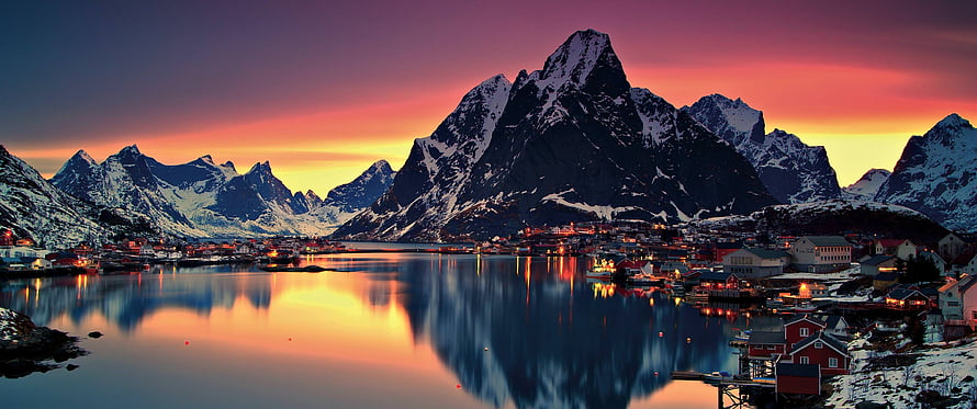 Reine Village in Lofoten Norway at Sunset with Snow-Capped Mountains and Fjord Reflections HD wallpaper