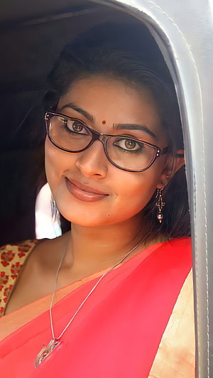 Sneha Tamil Actress Wearing Glasses and a Red Saree HD phone wallpaper