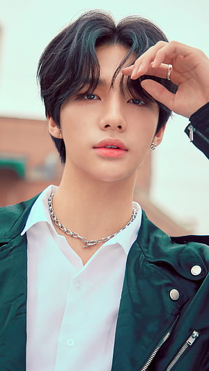 Hyunjin from StrayKids in a green jacket and white shirt with silver chain necklace HD phone wallpaper