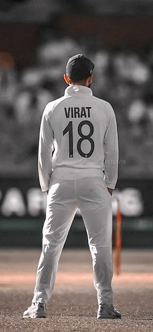 Virat Kohli in White Test Cricket Kit Standing on the Field HD phone wallpaper