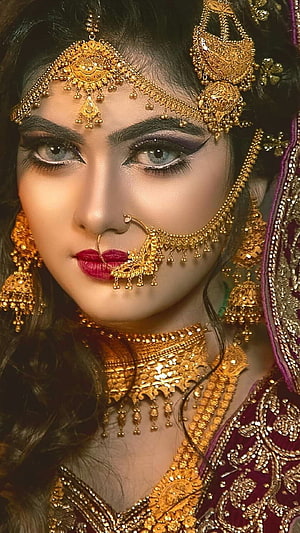 Elegant Indian Bride Portrait With Intricate Gold Jewelry And Traditional Bridal Makeup HD phone wallpaper