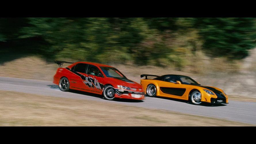 Fast and Furious Tokyo Drift Red and Yellow Sports Cars Racing on a Winding Road HD wallpaper