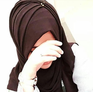 Elegant Black Hijab Style for Muslim Women with Soft Fabric Drape HD wallpaper