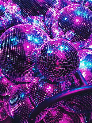 Vibrant Pink and Blue Disco Balls in a Dense Cluster with Neon Lighting HD phone wallpaper