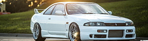 White Nissan Skyline R32 GTS-T Coupe with Aftermarket Wheels and Rear Spoiler HD wallpaper