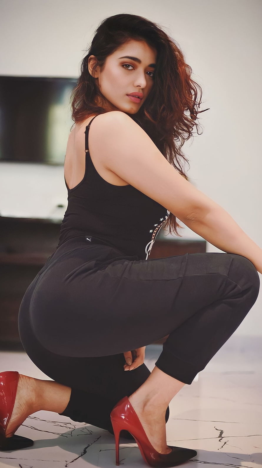 Kethika Sharma in Black Tank Top and High Heels HD phone wallpaper