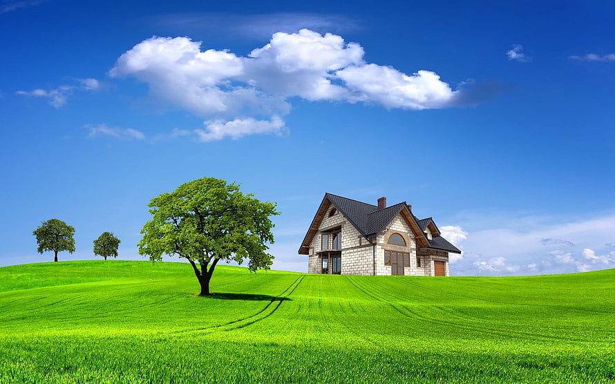 Serene stone cottage on a lush green hillside under a bright blue sky with fluffy clouds HD wallpaper