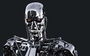Terminator T-800 Endoskeleton with Glowing Red Eyes on Dark Background HD wallpaper