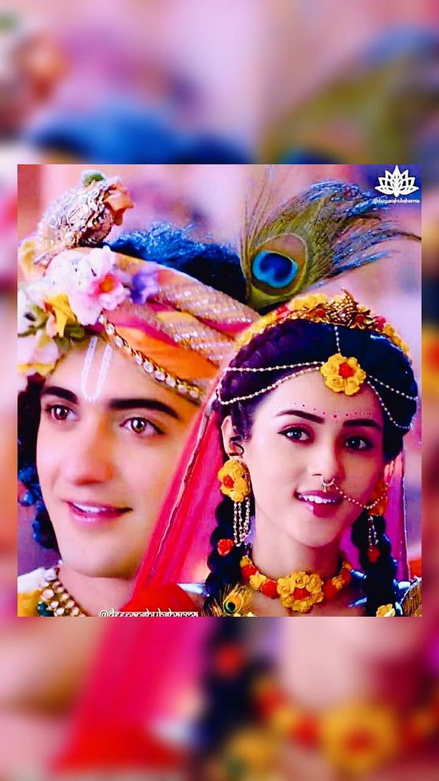 Radhe Krishna in ornate traditional Indian attire with peacock feather and floral jewelry HD phone wallpaper