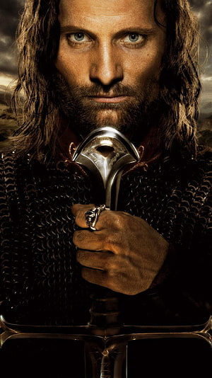 Aragorn Holding Sword in Chainmail Armor from The Lord of the Rings HD phone wallpaper
