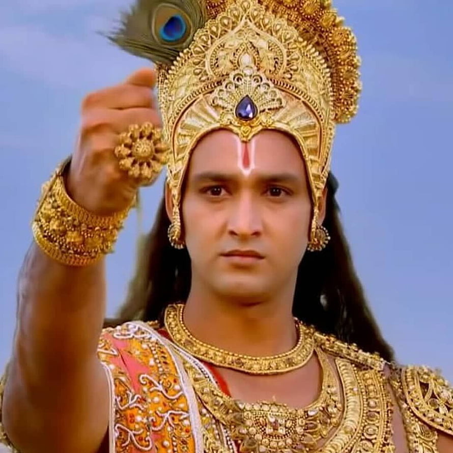 Lord Krishna in ornate golden crown and peacock feather from Mahabharata 2013 HD phone wallpaper