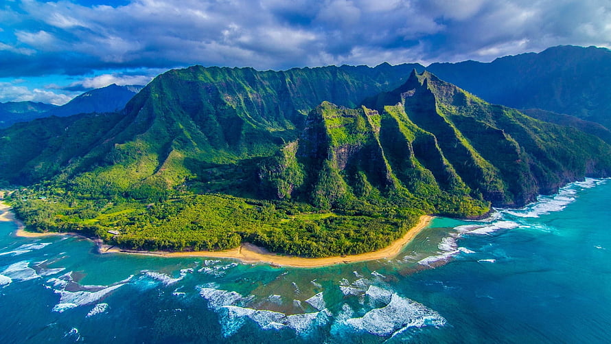 Aerial View of Lush Green Mountains and Turquoise Ocean in Hawaii HD wallpaper