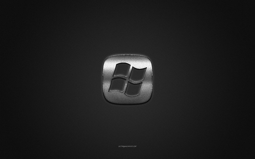 Windows 11 Silver Metal Emblem on Dark Carbon Fiber Background HD wallpaper