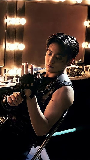 Jungkook BTS backstage portrait in dark leather outfit with fingerless gloves and vanity mirror lights HD phone wallpaper