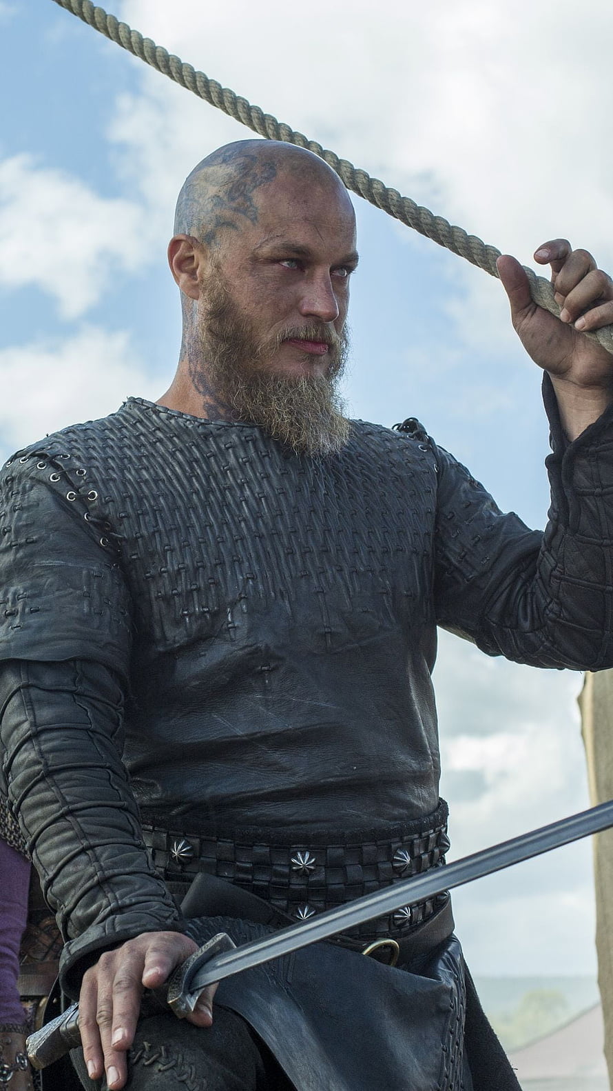 Ragnar Lothbrok in Viking Armor Holding Sword and Rope HD phone wallpaper