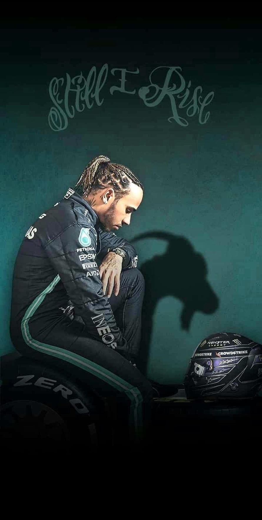 Lewis Hamilton in Mercedes F1 Racing Suit Sitting on Tire with Helmet HD phone wallpaper