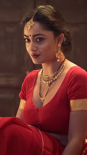 Tridha Choudhury in Traditional Red Attire with Gold Jewelry and Maang Tikka HD phone wallpaper