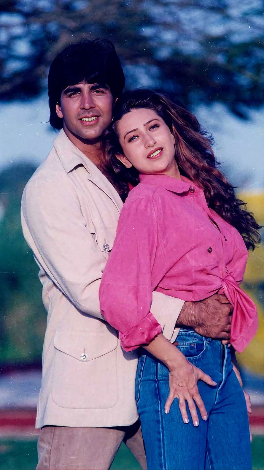 Akshay Kumar and Karishma Kapoor in a Romantic Embrace HD phone wallpaper