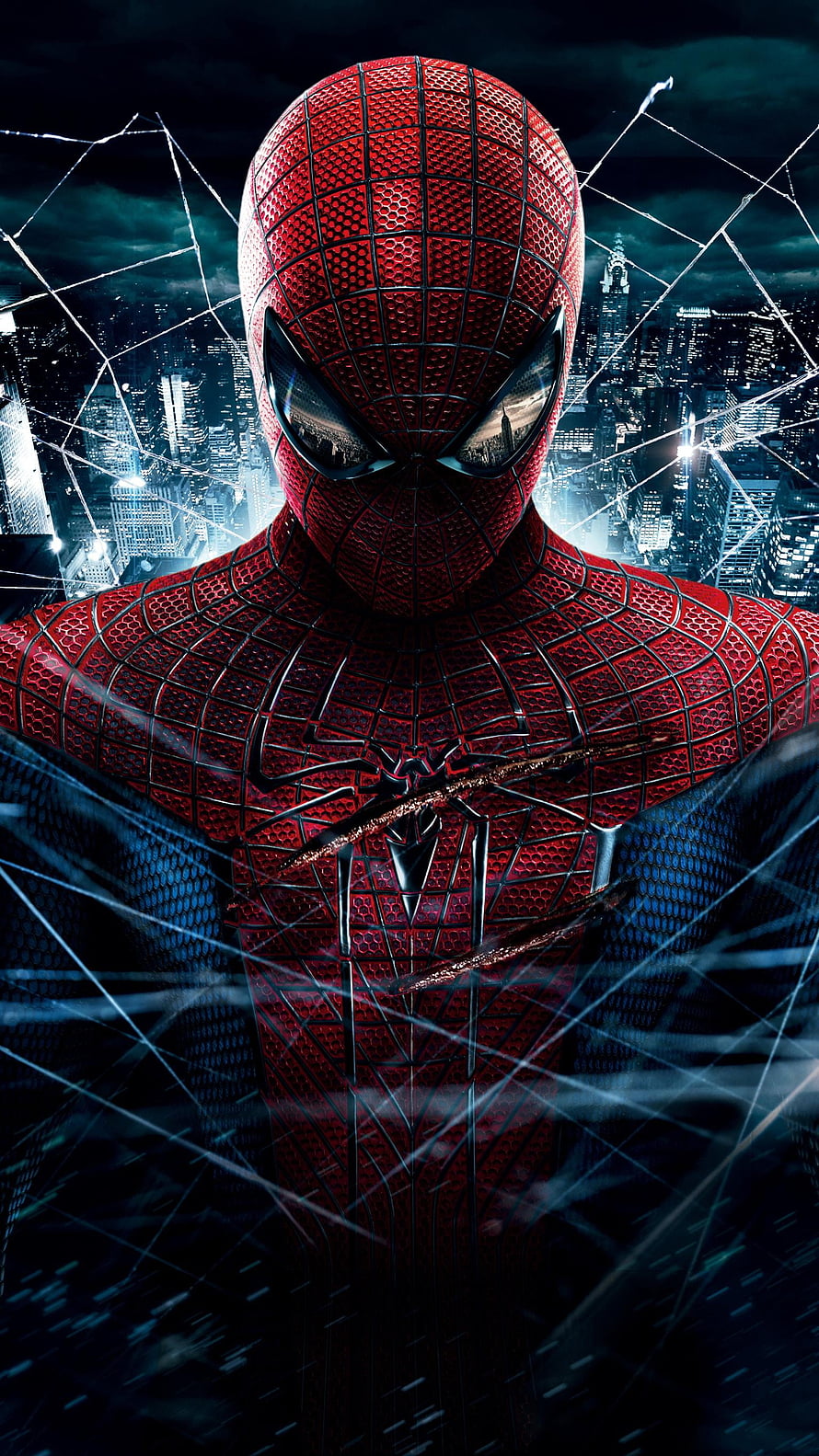 Spider-Man in Classic Red Suit with Webbing Against Nighttime City Skyline HD phone wallpaper