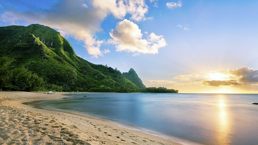Hawaii Beach at Sunset with Lush Green Mountains and Calm Turquoise Waters HD wallpaper
