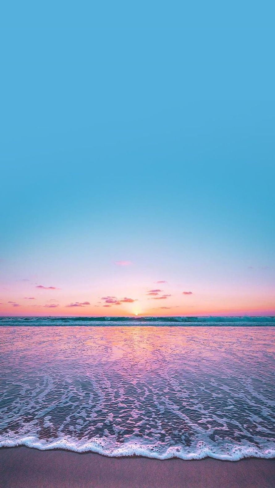 Pastel Ocean Sunset with Pink Horizon and Gentle Waves on a Sandy Beach HD phone wallpaper