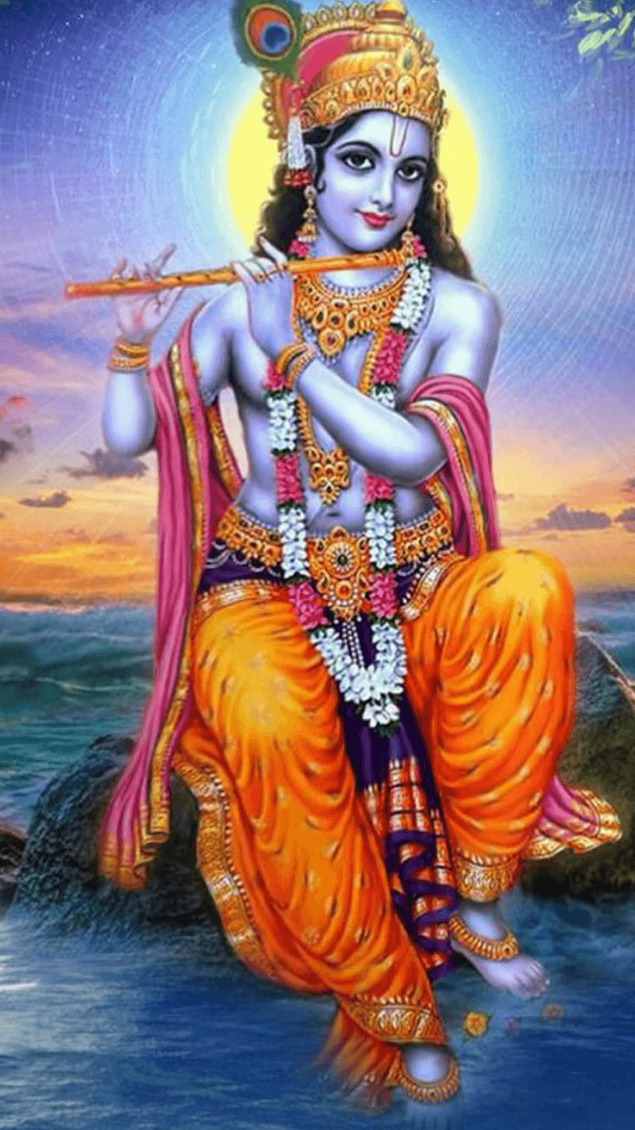 Lord Krishna Playing Flute by the Water at Sunset with Peacock Crown and Floral Garlands HD phone wallpaper