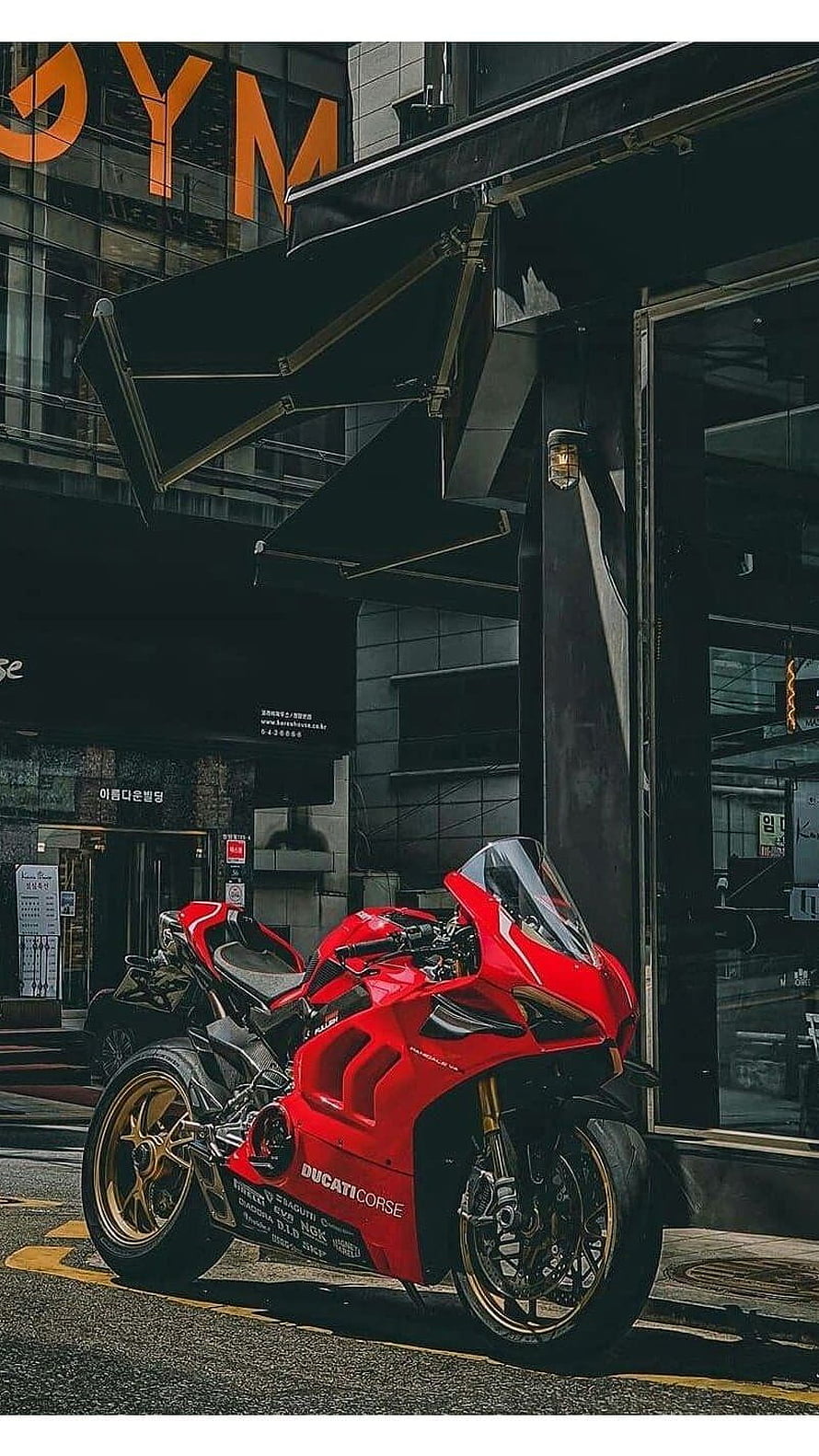 Red Ducati Panigale V4 Superleggera Parked on Urban Street HD phone wallpaper