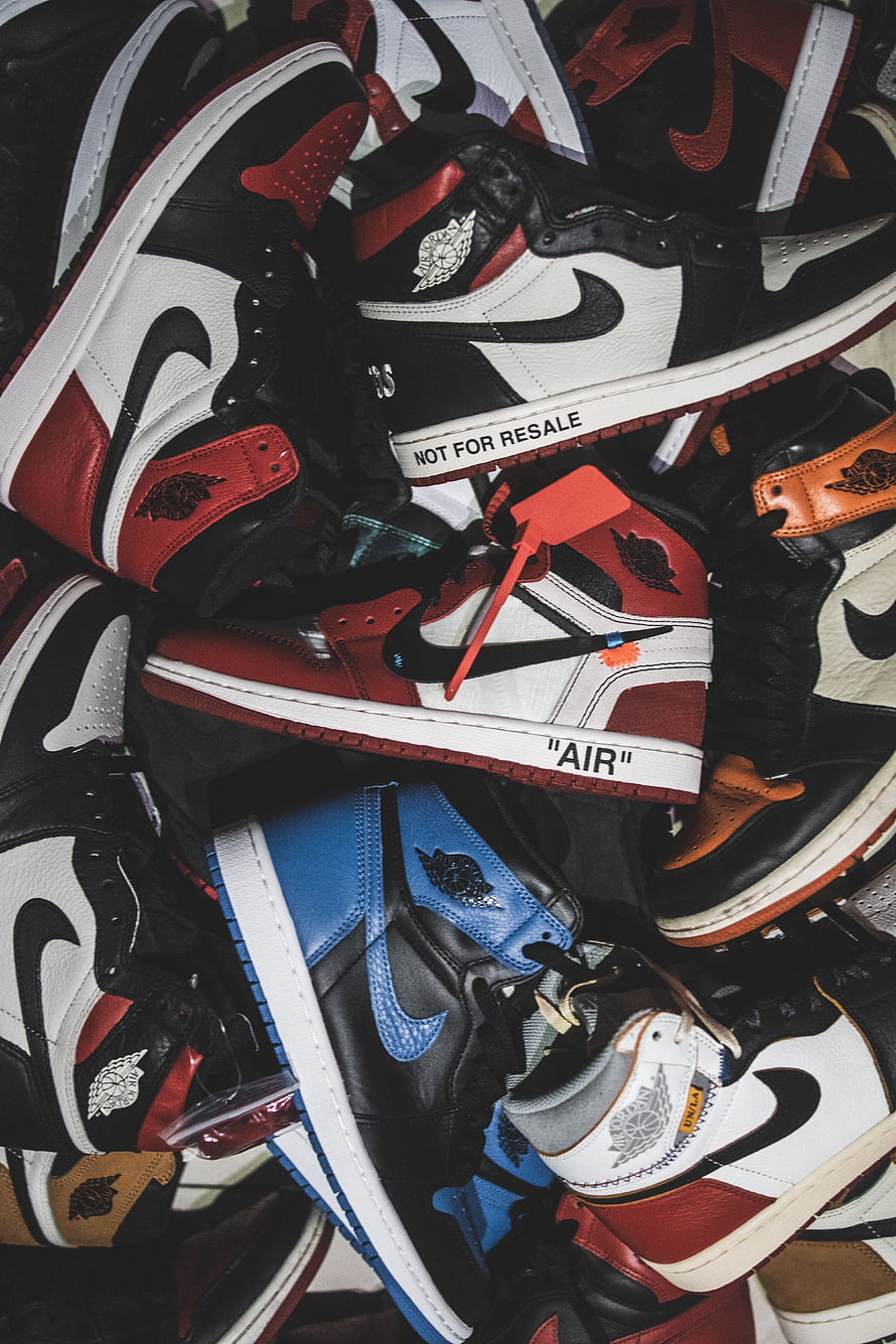 Air Jordan 1 High Sneakers in Chicago, Royal, and Bred Colorways Piled Together HD phone wallpaper