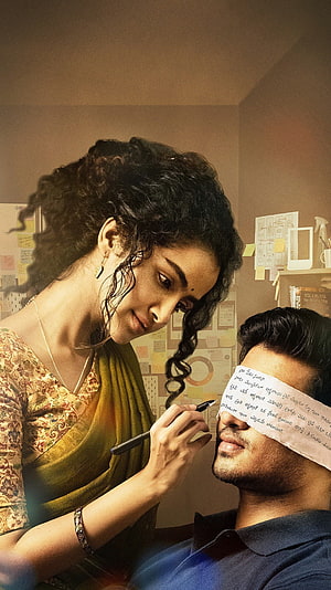Anupama Parmeshwaran and Nikhil in a dramatic scene from the film 18 Pages HD phone wallpaper