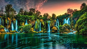 Kravice Waterfalls at Sunset with Lush Greenery and Turquoise Pool HD wallpaper