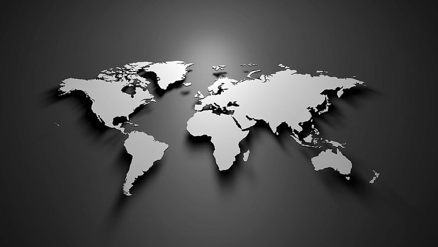 Monochrome 3D World Map with Soft Drop Shadows on Dark Gradient Background HD wallpaper
