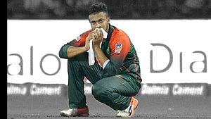 Shakib Al Hasan Crouching on Cricket Field in Bangladesh Green and Orange Kit HD wallpaper