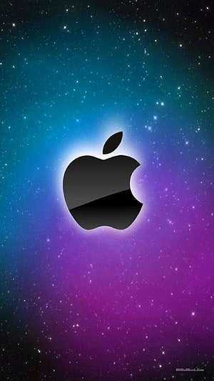 Apple Logo Glowing Against a Vibrant Cosmic Starfield Gradient HD phone wallpaper