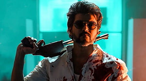 Thalapathy Vijay in Beast with shotgun and blood-stained shirt HD wallpaper