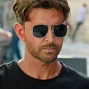 Hrithik Roshan Wearing Aviator Sunglasses and Black T-Shirt in Close-Up Portrait HD phone wallpaper