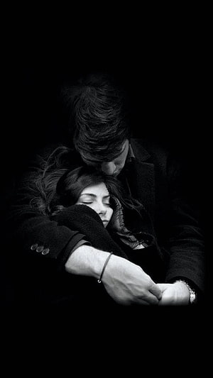 Intimate Black and White Portrait of a Couple Embracing in Darkness HD phone wallpaper