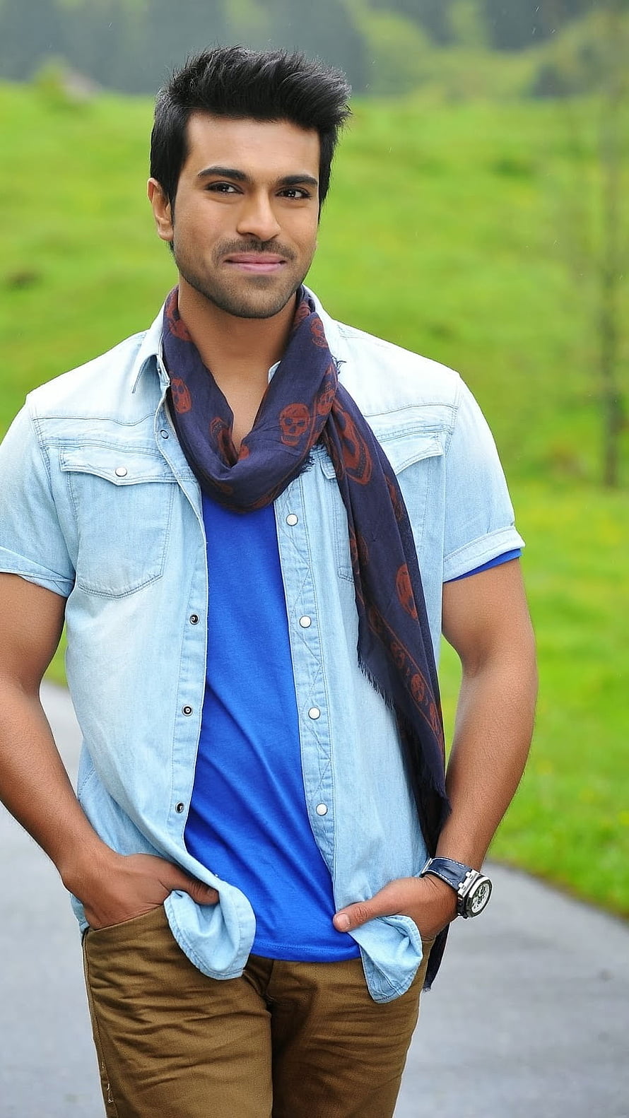Ram Charan in Casual Denim Outfit with Patterned Scarf and Blue Tee HD phone wallpaper