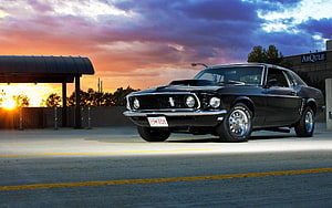 Black 1968 Ford Mustang Fastback Classic Muscle Car at Sunset HD wallpaper
