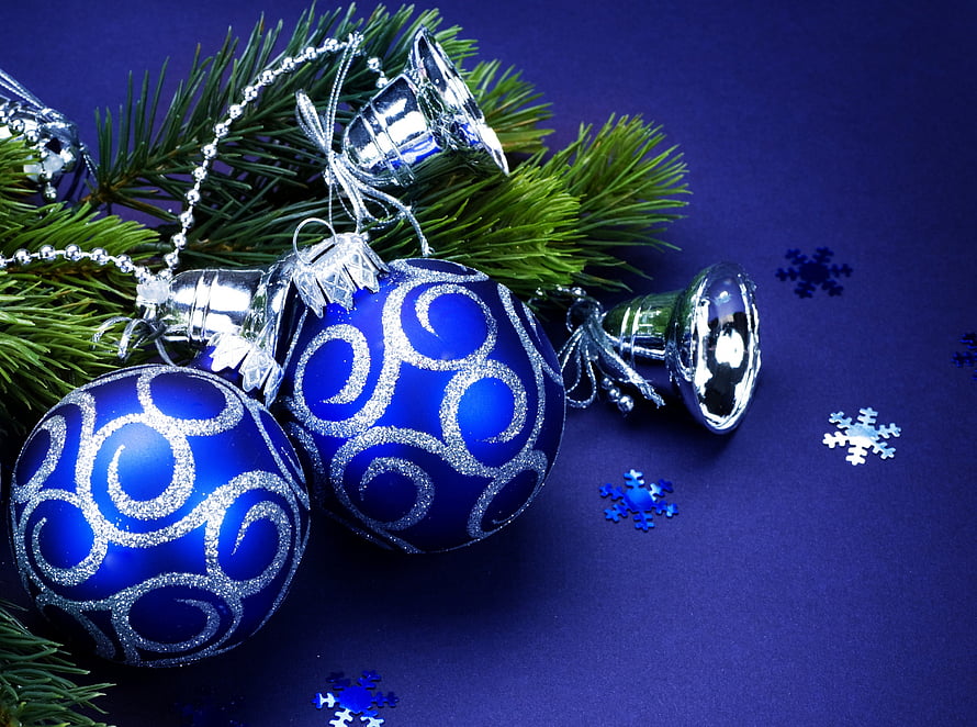 Blue Christmas Ornaments with Silver Bells and Pine Branches on a Deep Blue Background HD wallpaper
