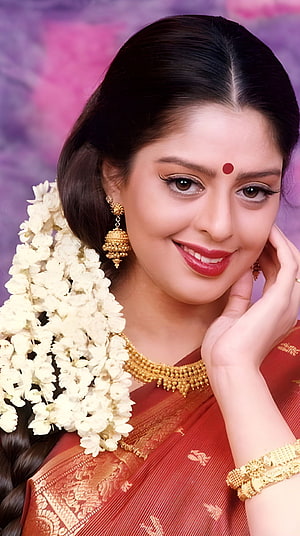 Nagma in a Red Silk Saree with Gold Jewelry and Jasmine Garland HD phone wallpaper