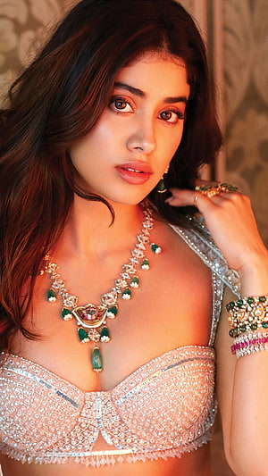 Jahnavi Kapoor in an ornate silver lehenga with emerald and diamond jewelry HD phone wallpaper