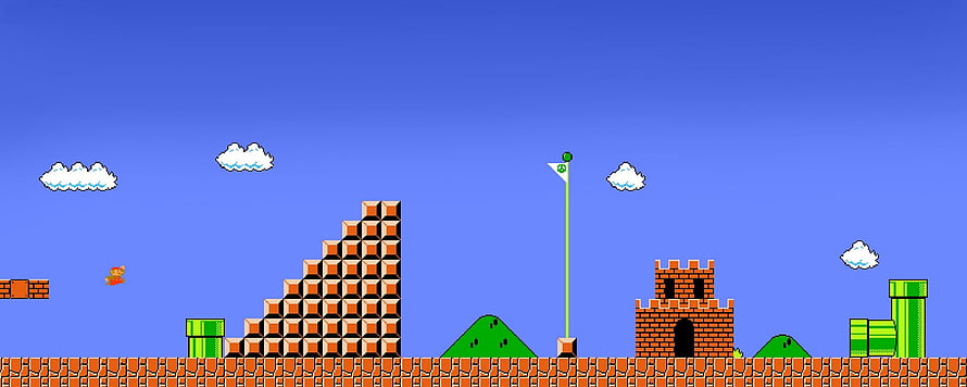 Classic 8-bit Mario Bros Level with Castle, Flagpole, and Pixel Art Landscape HD wallpaper