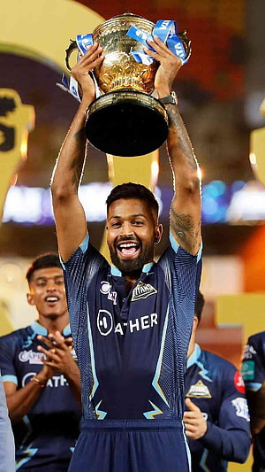 Hardik Pandya Lifts Gujarat Titans Trophy in IPL Celebration HD phone wallpaper