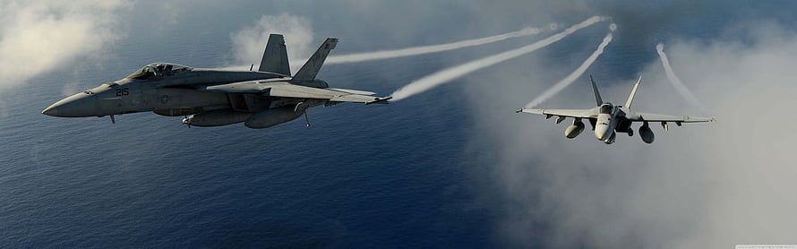 F-14 Tomcat and F/A-18 Super Hornet fighter jets in formation over the ocean HD wallpaper
