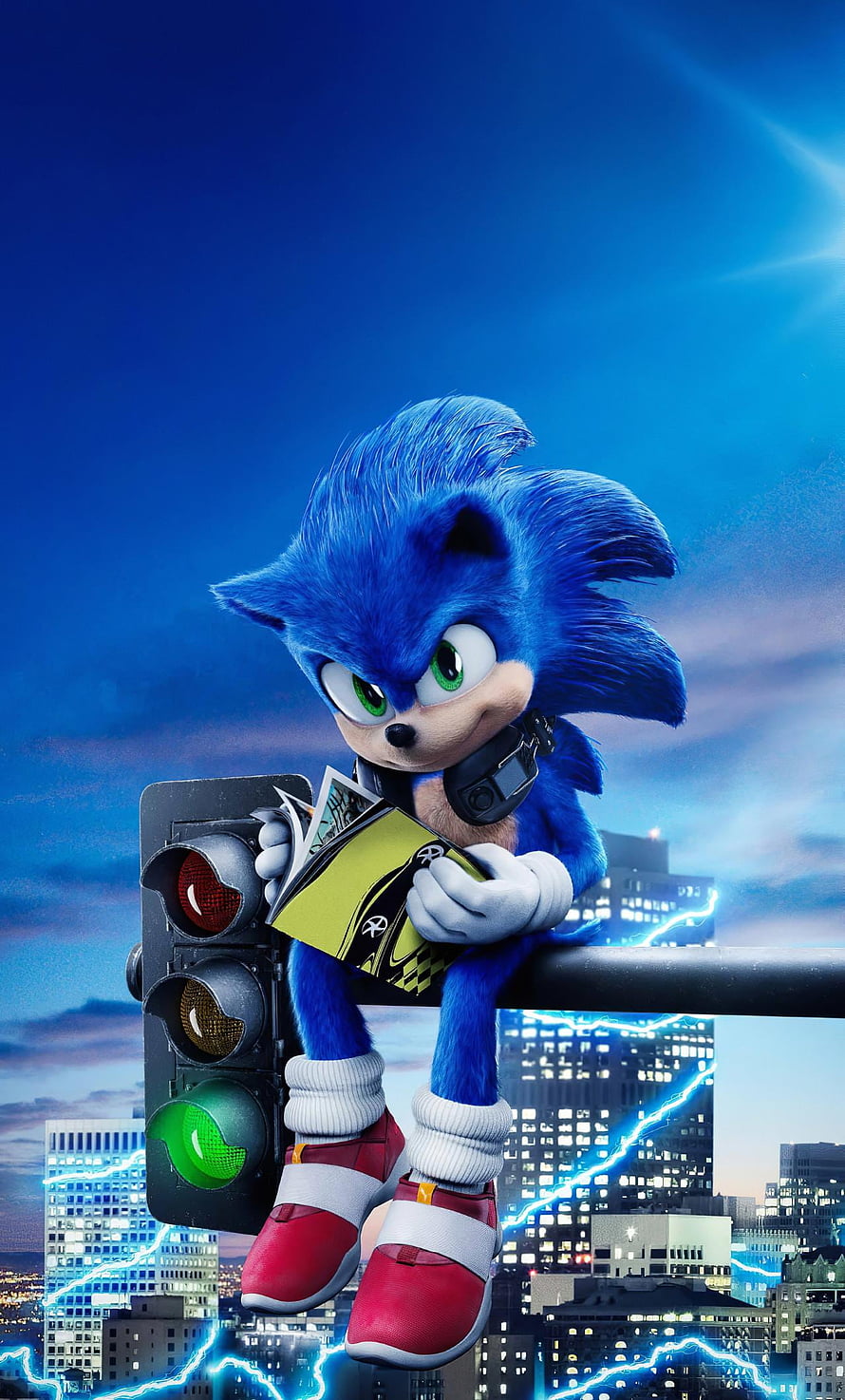 Sonic the Hedgehog Sitting on Traffic Light with Comic Book in City Skyline HD phone wallpaper