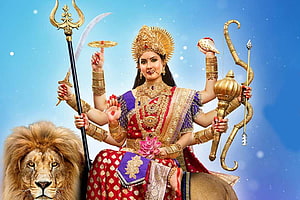 Maa Vaishno Devi with Lion and Traditional Weapons on Blue Background HD wallpaper