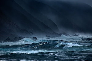 Dark Ocean Storm with Crashing Waves and Misty Rocky Coastline HD wallpaper